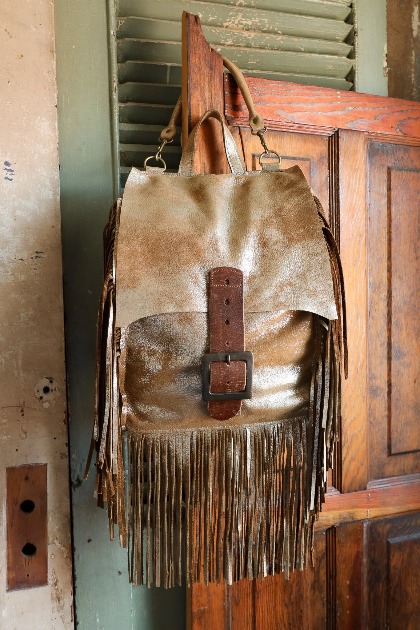Two Bar West Fringe With Buckle Distress Backpack
