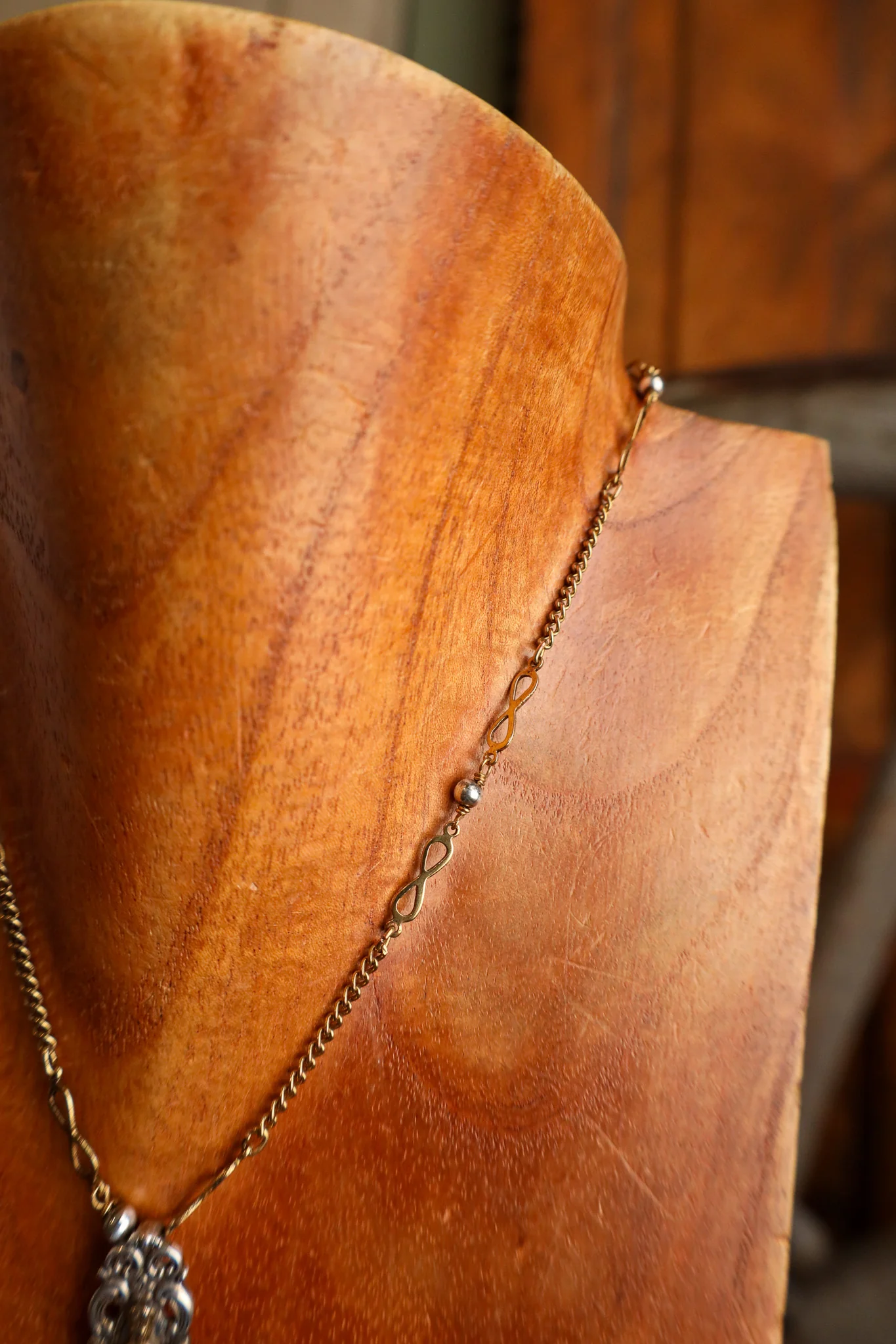 Andrea Barnett Bronze Crucifix Infinity Chain Necklace - Image 4
